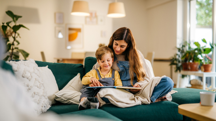 A parent reads to their child