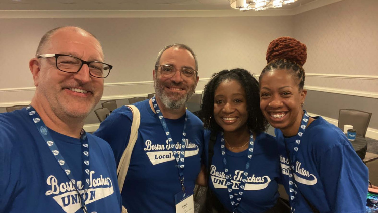 Mark Lonergan, Paul Tritter, and fellow Boston educators at a conference in 2025