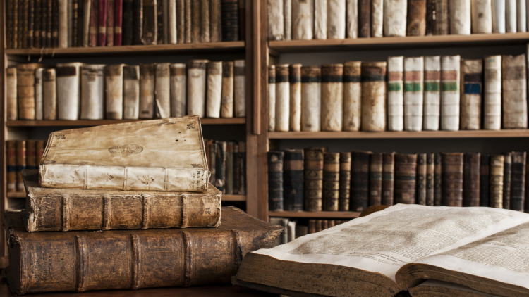 stack of old, antique books