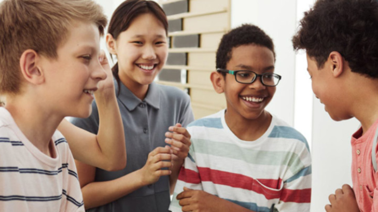 Students happy in school hallway