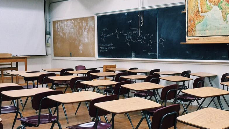 empty chairs in classroom