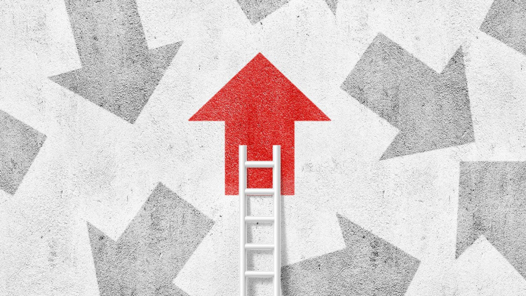 Red arrow at the top of a ladder