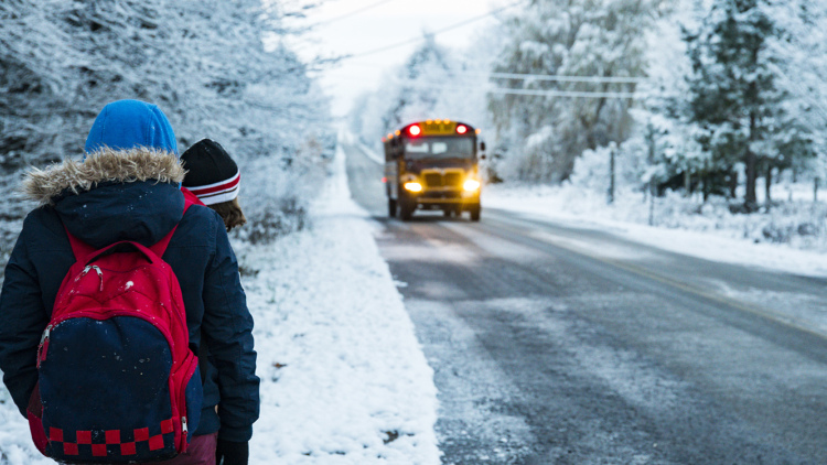 School bus stop in snow