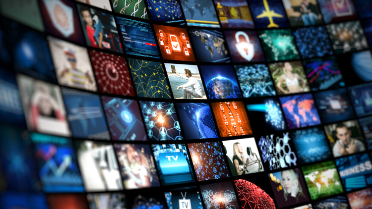 conceptual wall of brightly colored screens showing different kinds of images
