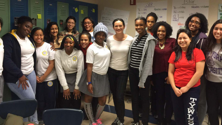 Claudia Espinosa with students in Harlem