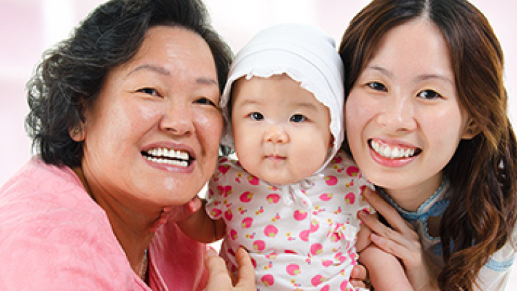 Multigenerational family with grandmother, infant, and mother
