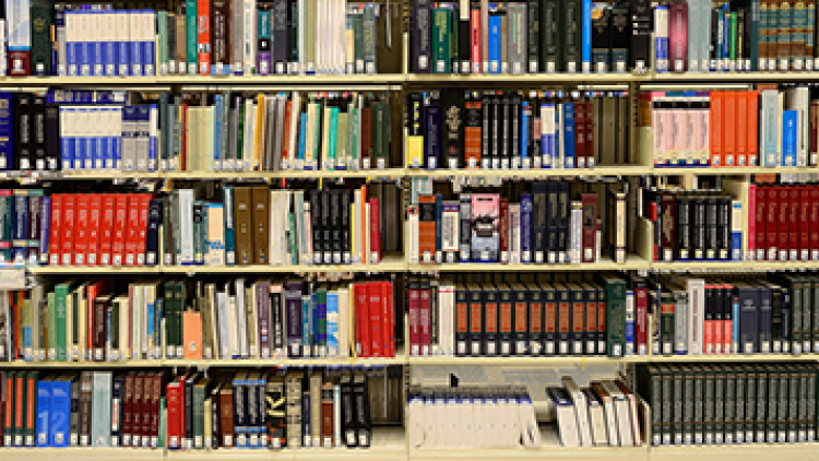 Stacks of books in a library