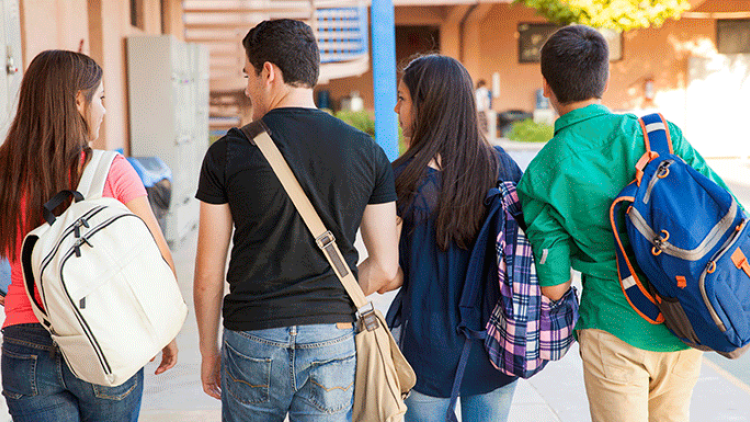 teenage students with backpacks