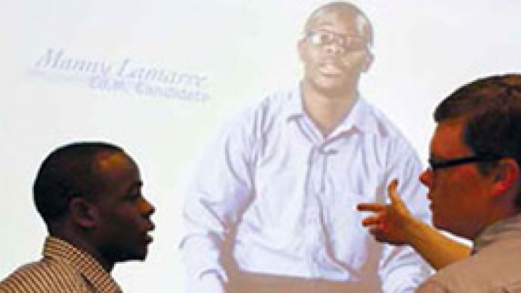 Manny Lamarre, Ed.M.'13, and Mark Robertson