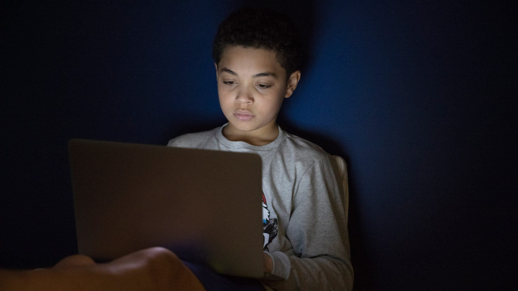 Young boy with computer