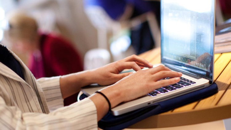 student working on laptop