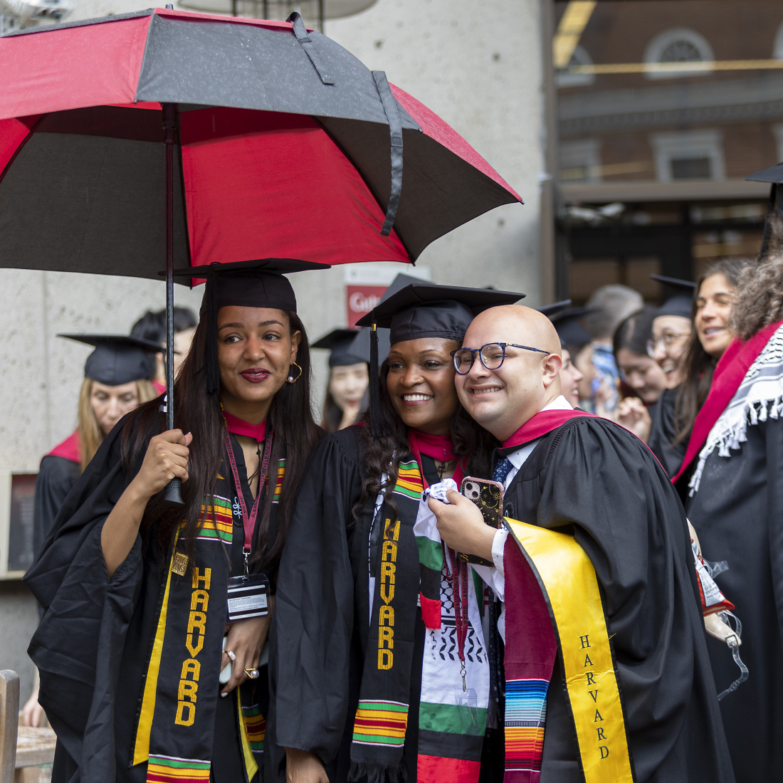 graduates in the rain