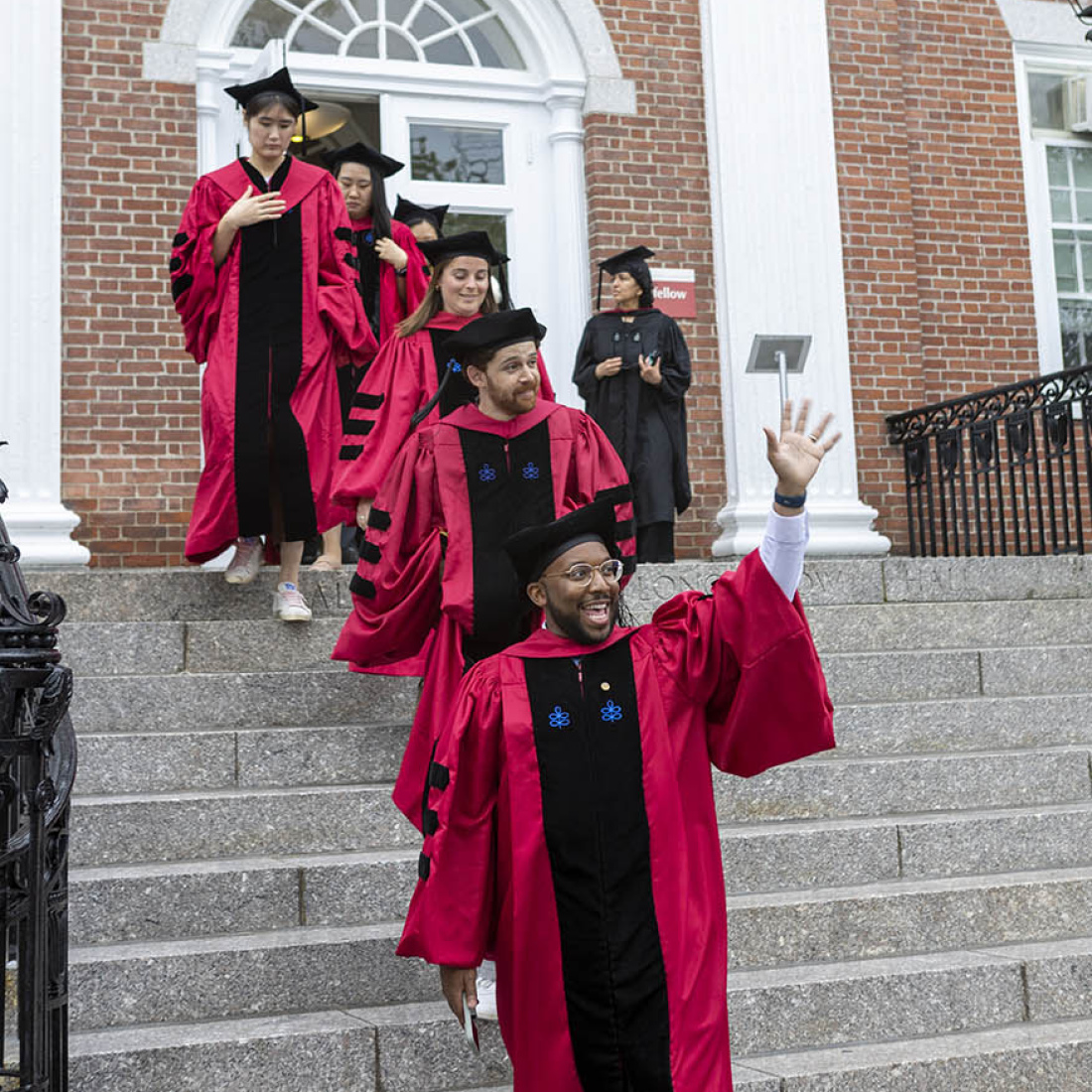 Graduates coming down the stairs