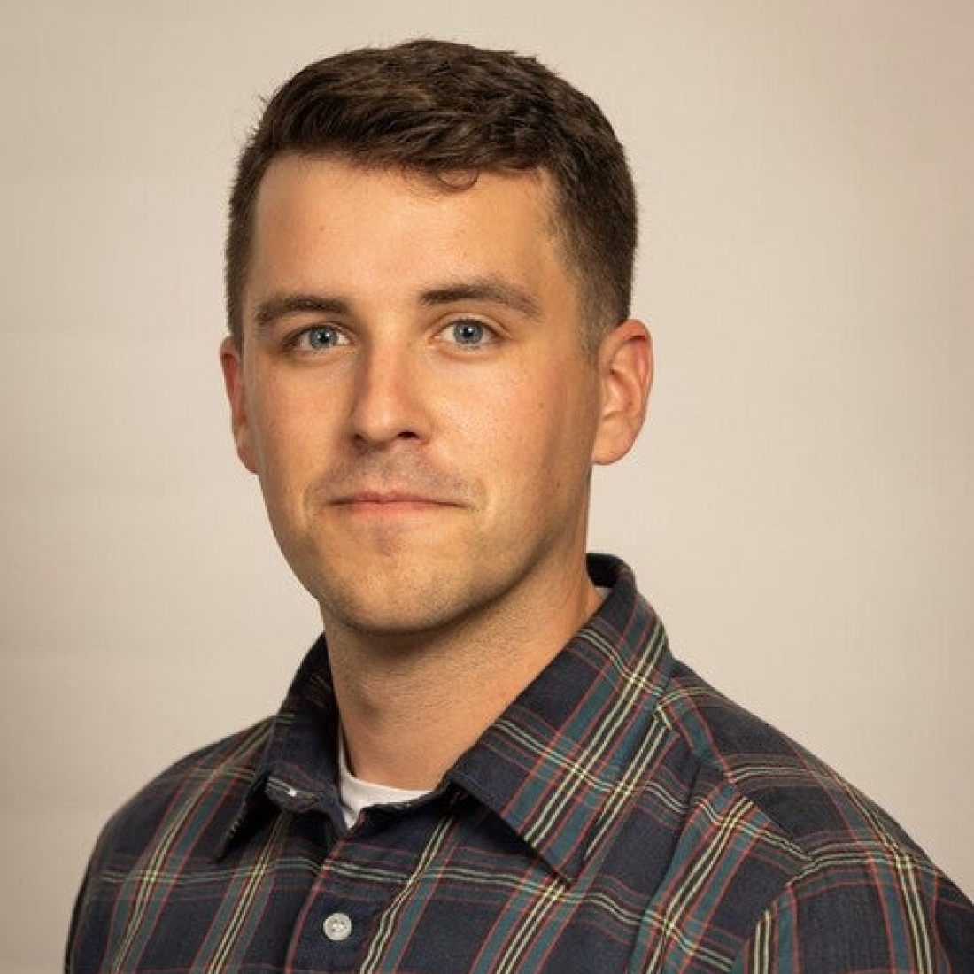 Adam Milano's headshot