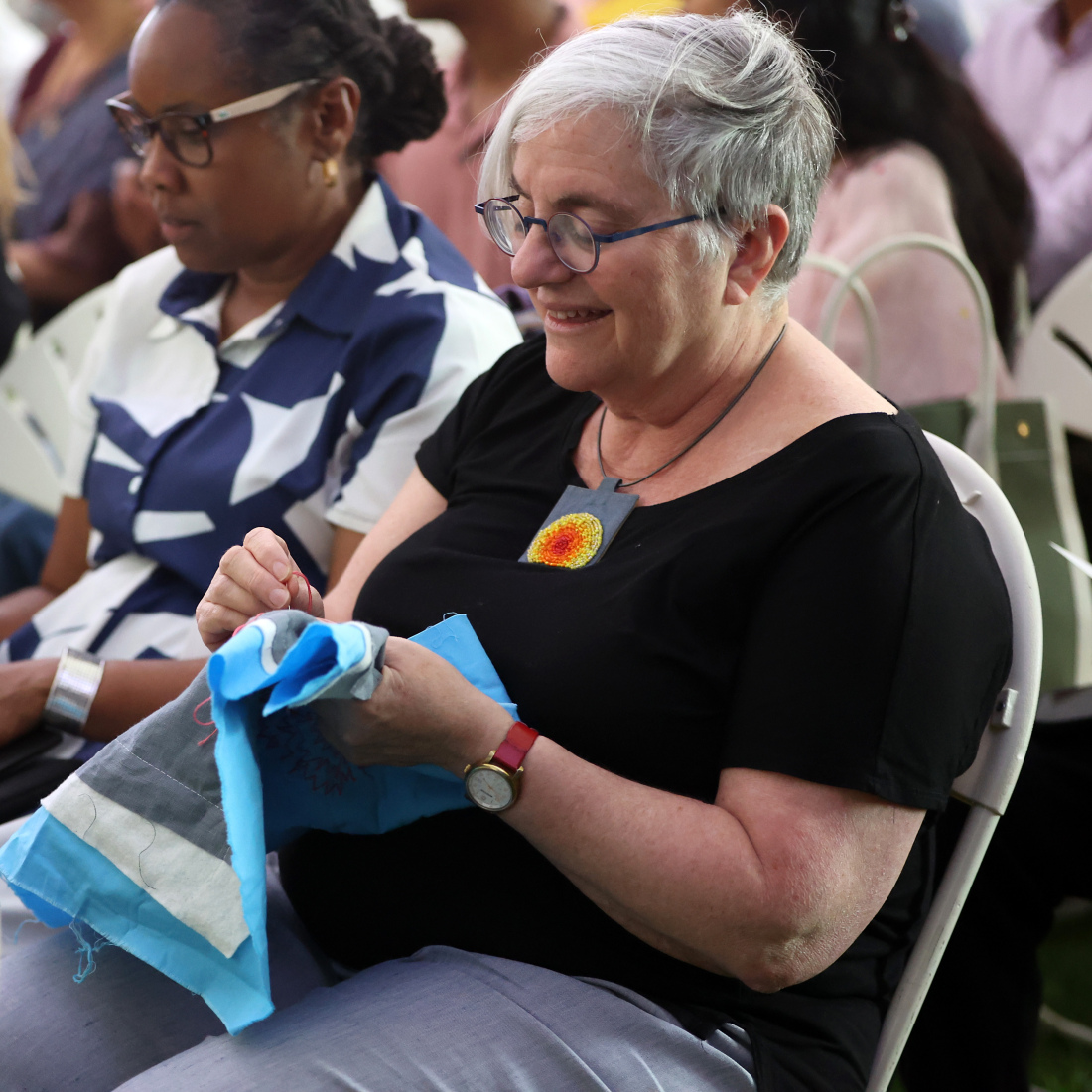 Julie Reuben doing needlepoint