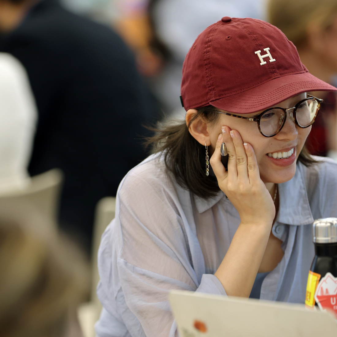 Student in Harvard hat at the OEL On Campus Institute