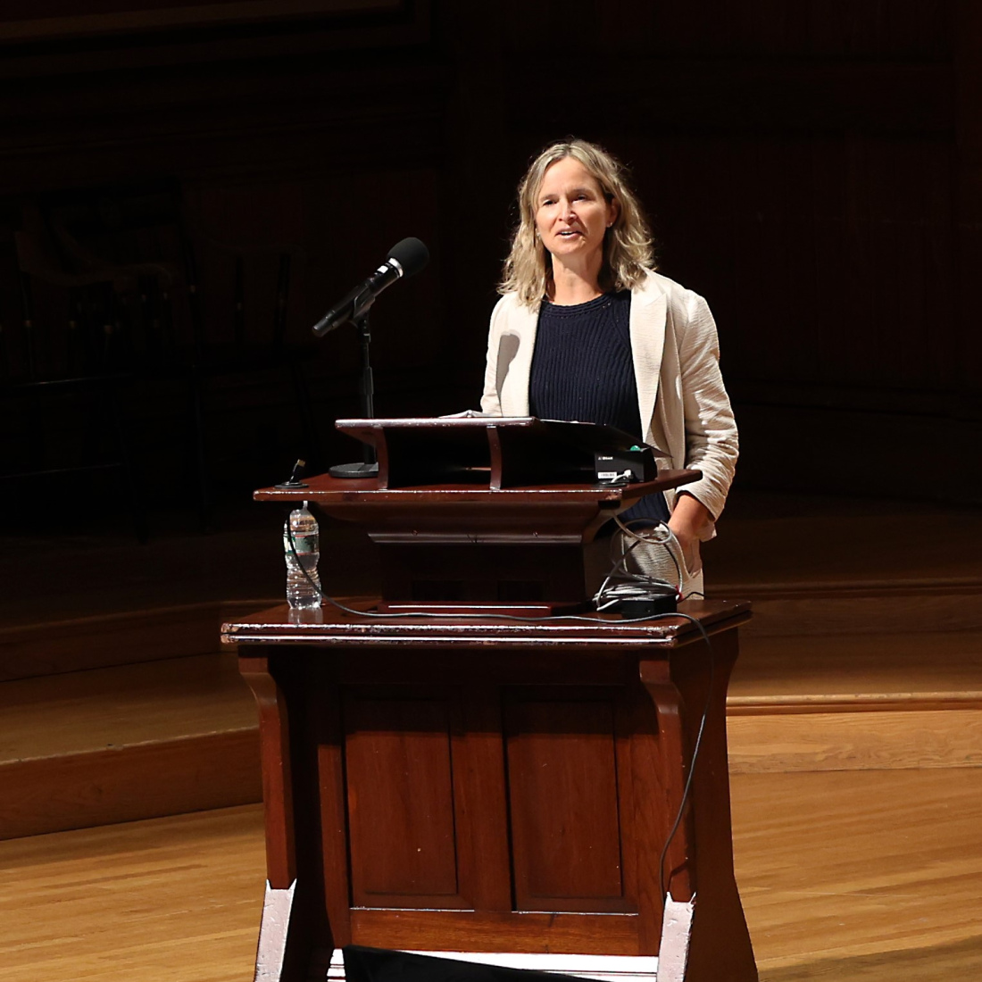 Dean Nonie Lesaux welcomes everyone in Sanders Theatre