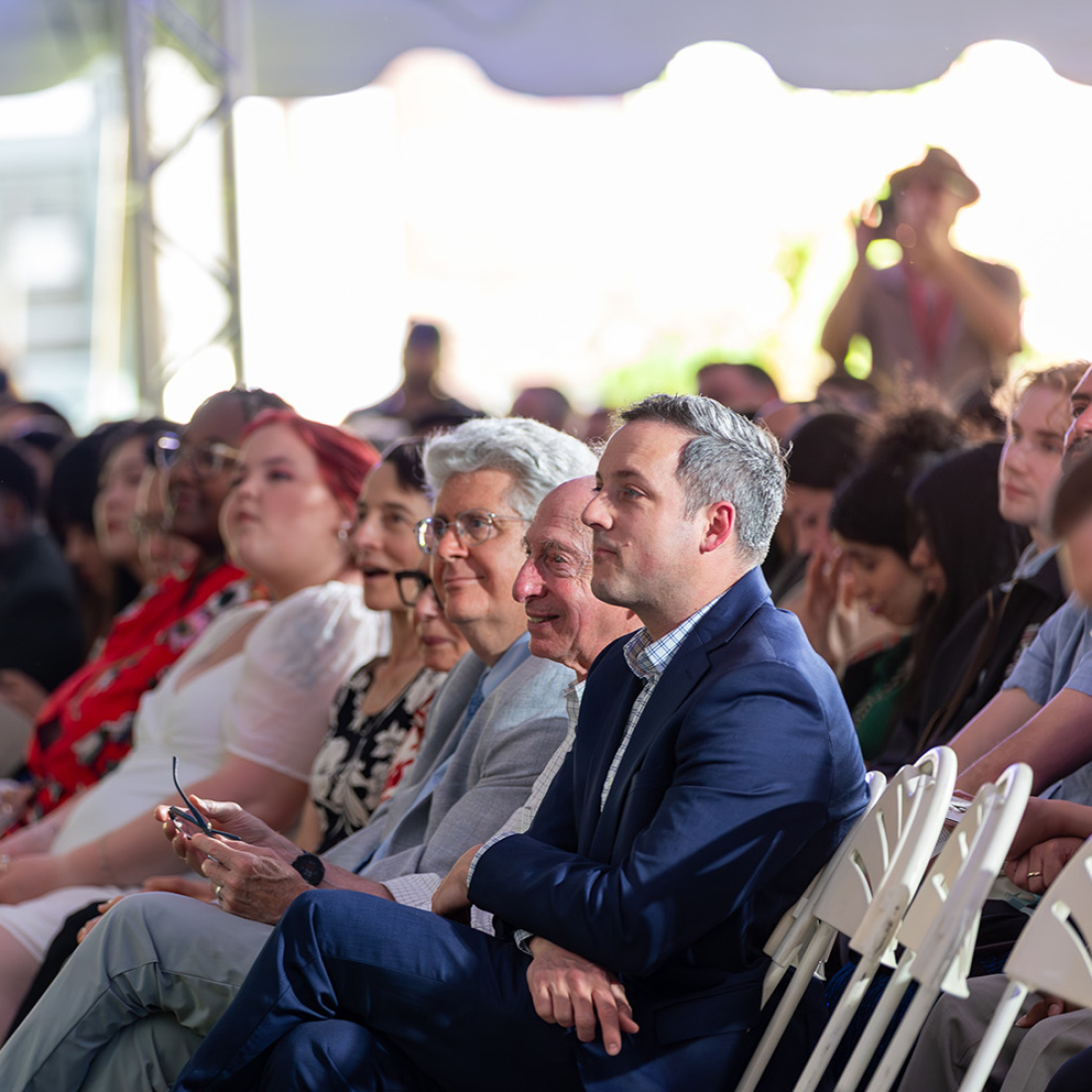 Faculty watch from audience