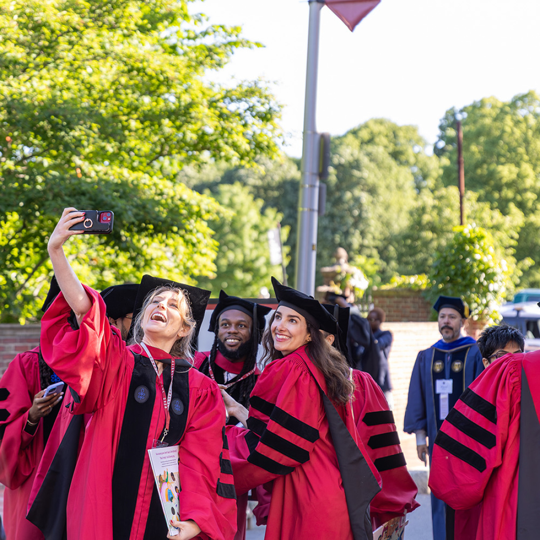 Graduates taking selfie