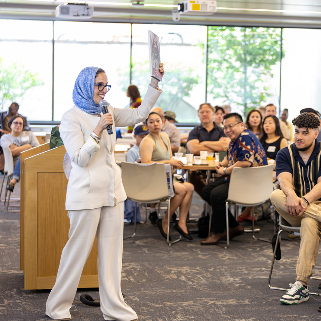 Student speaking at OEL celebration