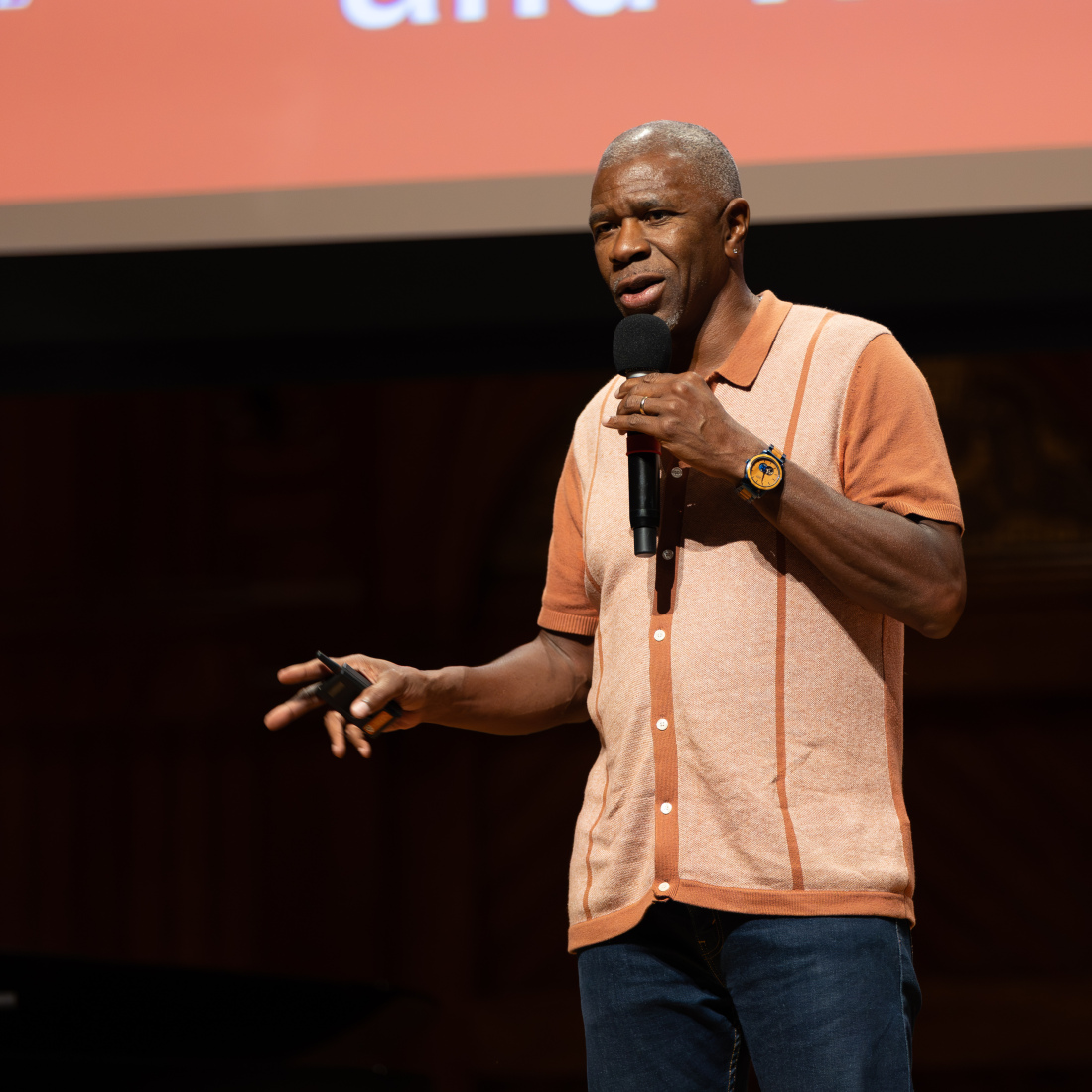 Professor Shawn Ginwright speaking to everyone in Sanders Theatre