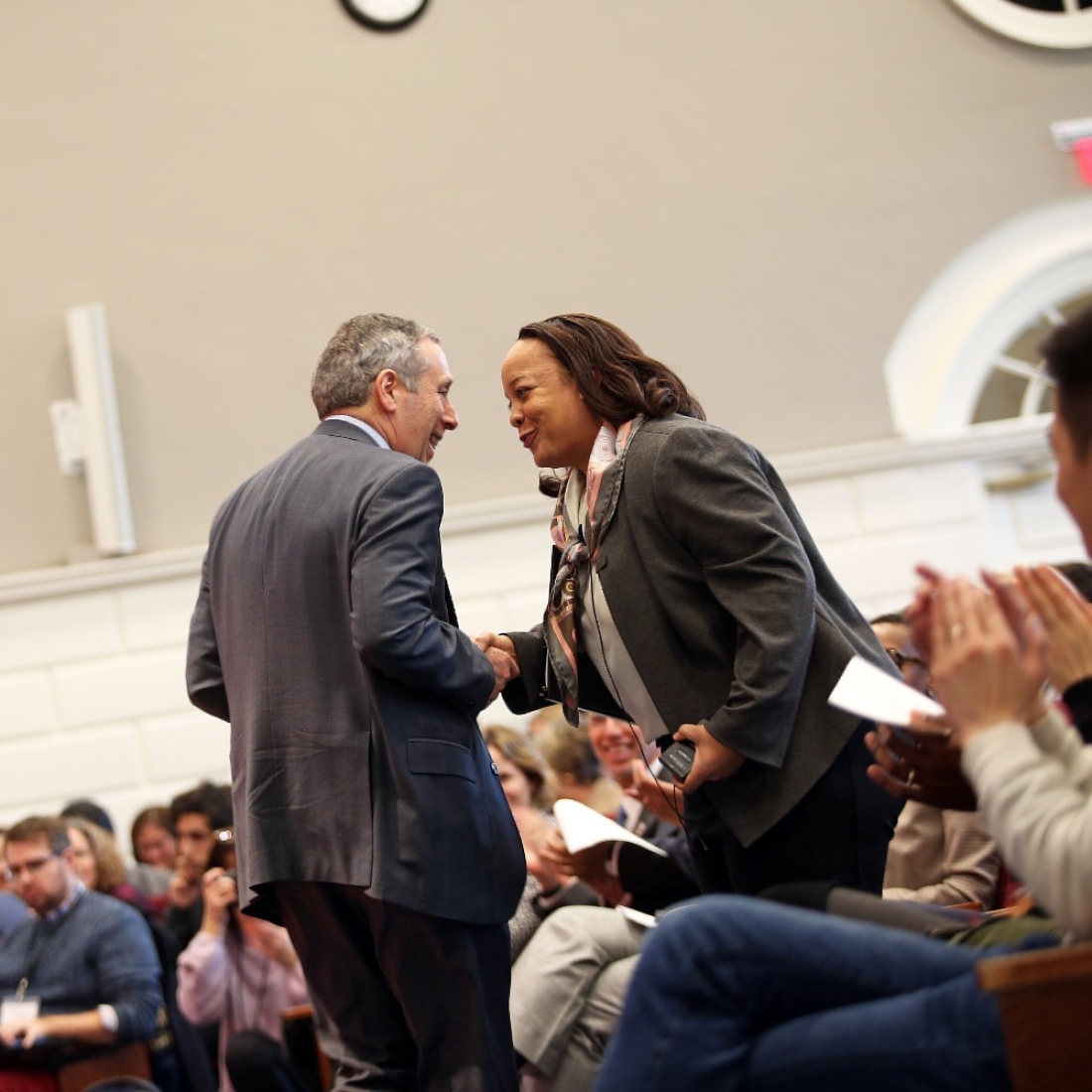 Dean Bridget Terry Long greets Harvard President Lawrence Bacow