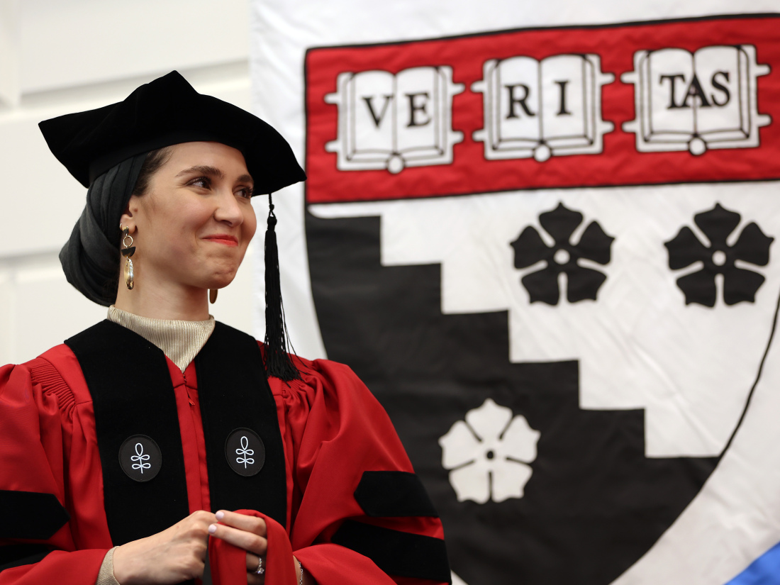 Student awaiting her Ph.D. robes