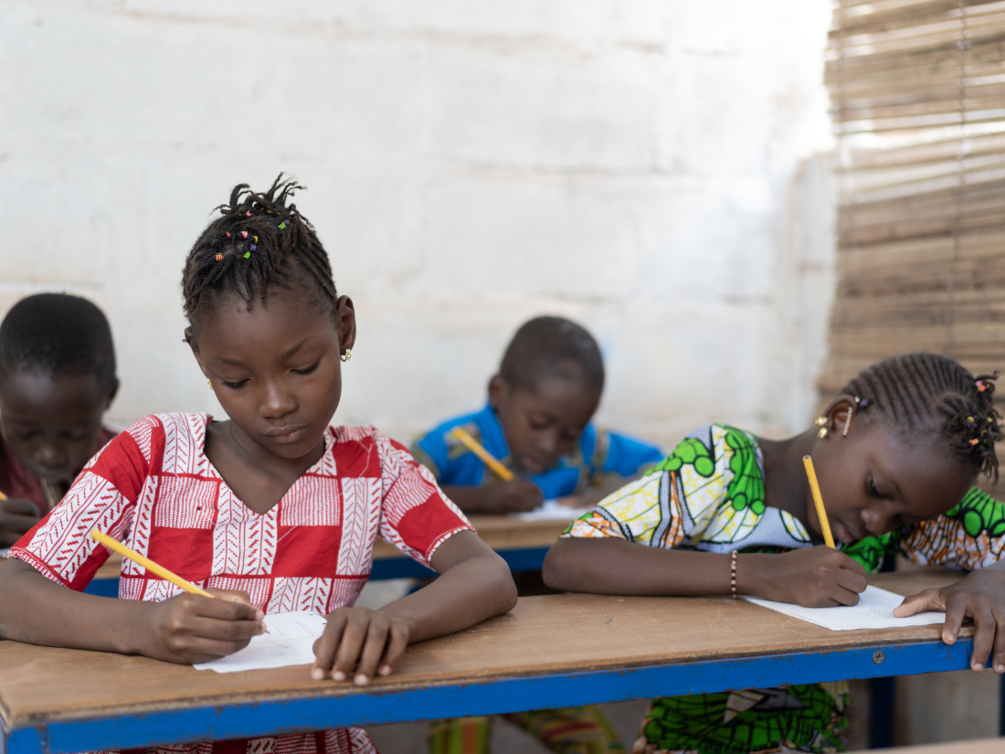 students learning at a table