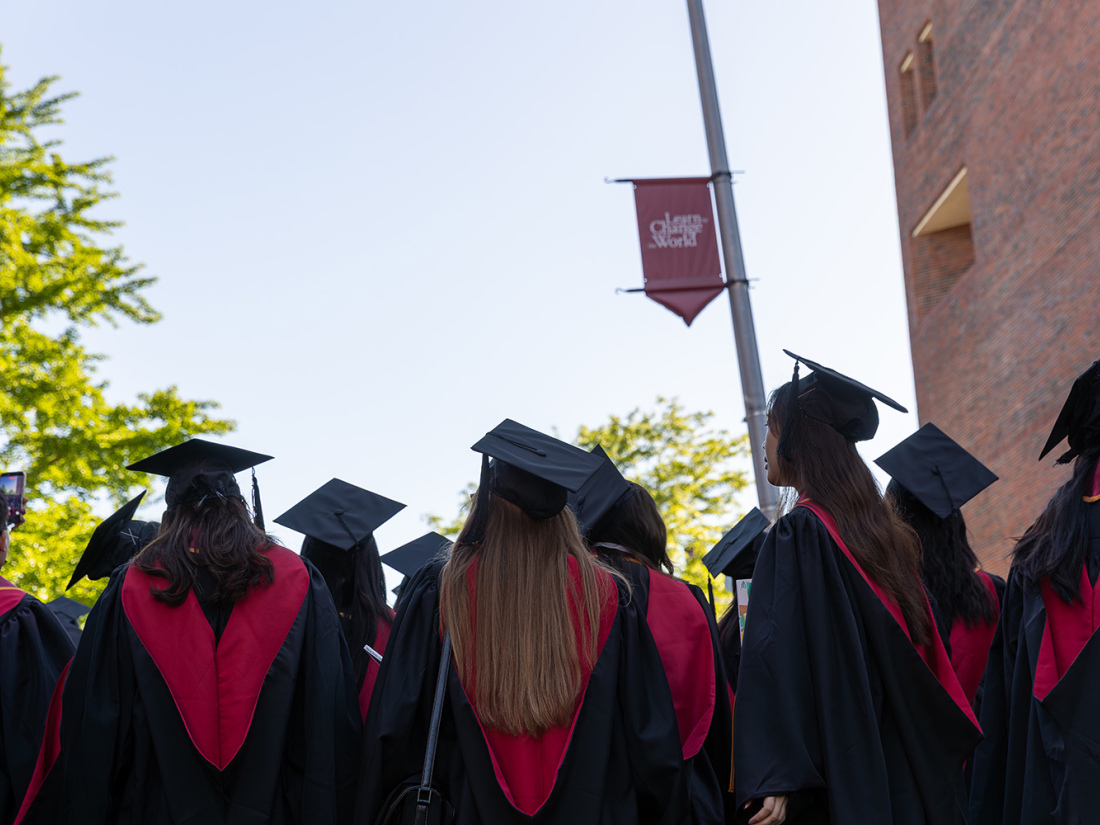 Photo of grads from behind