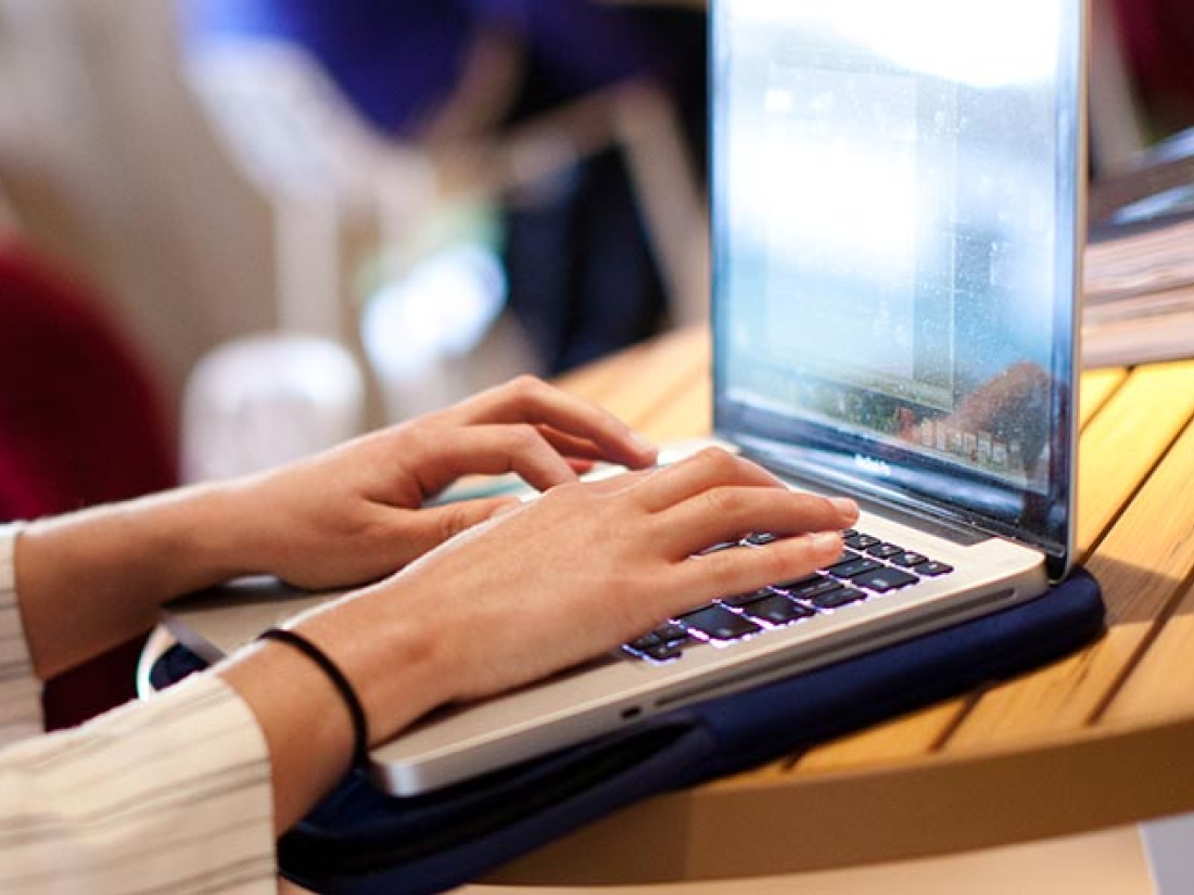 student working on laptop