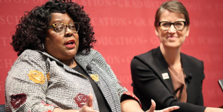 Deborah Jewell-Sherman participates in a forum in Askwith Hall.
